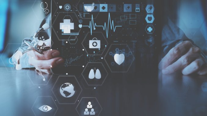 medical techonlogy concept,smart doctor hand working with modern laptop computer in modern office with virtual icon diagram